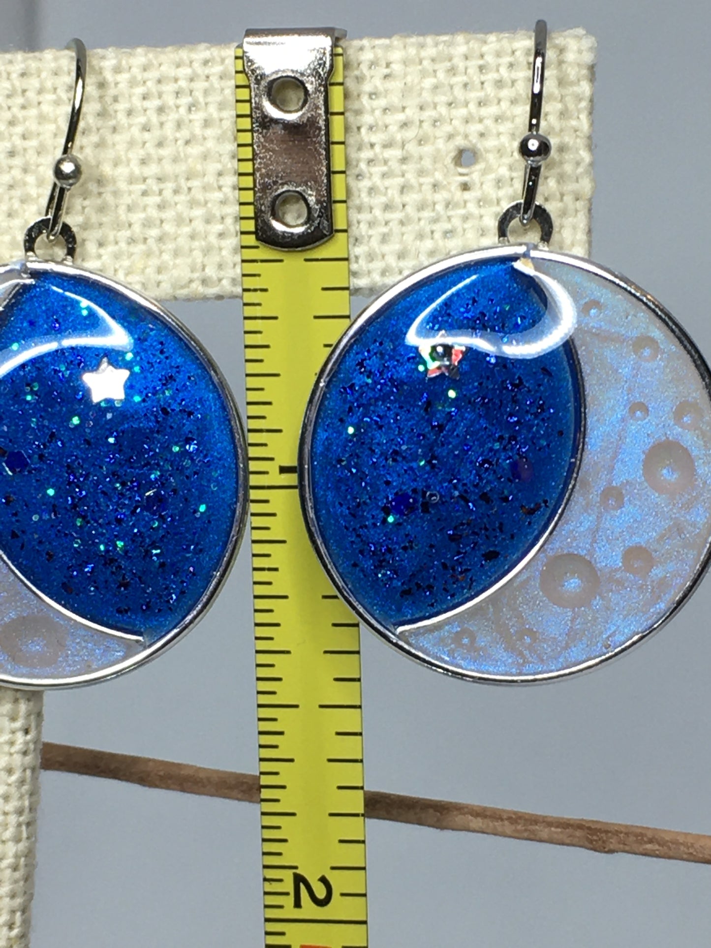 Crescent moon earrings.