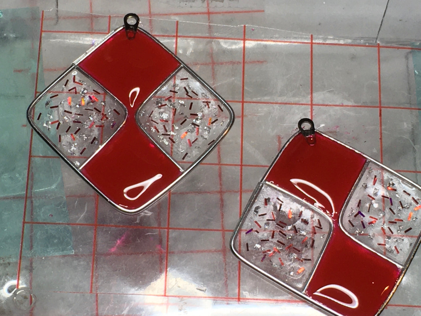 Red and silver resin earrings