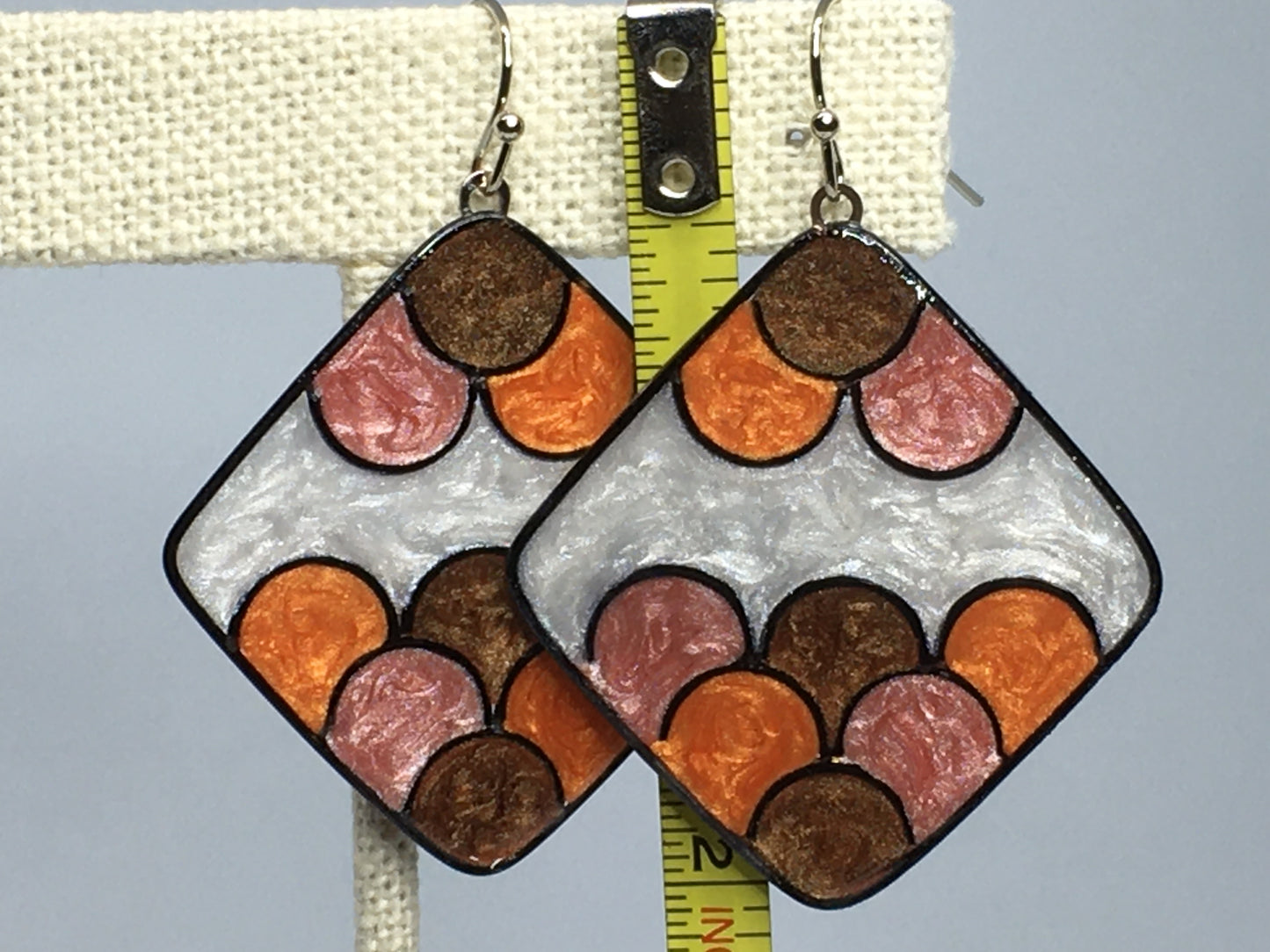 Brown, orange, apricot and white earrings