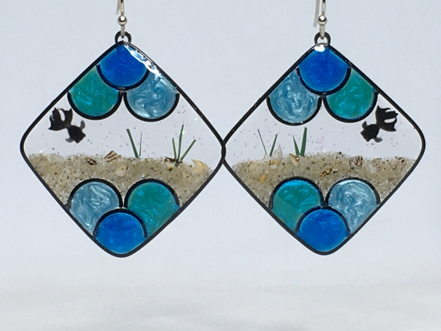 Goldfish earrings, blue, teal, and mint