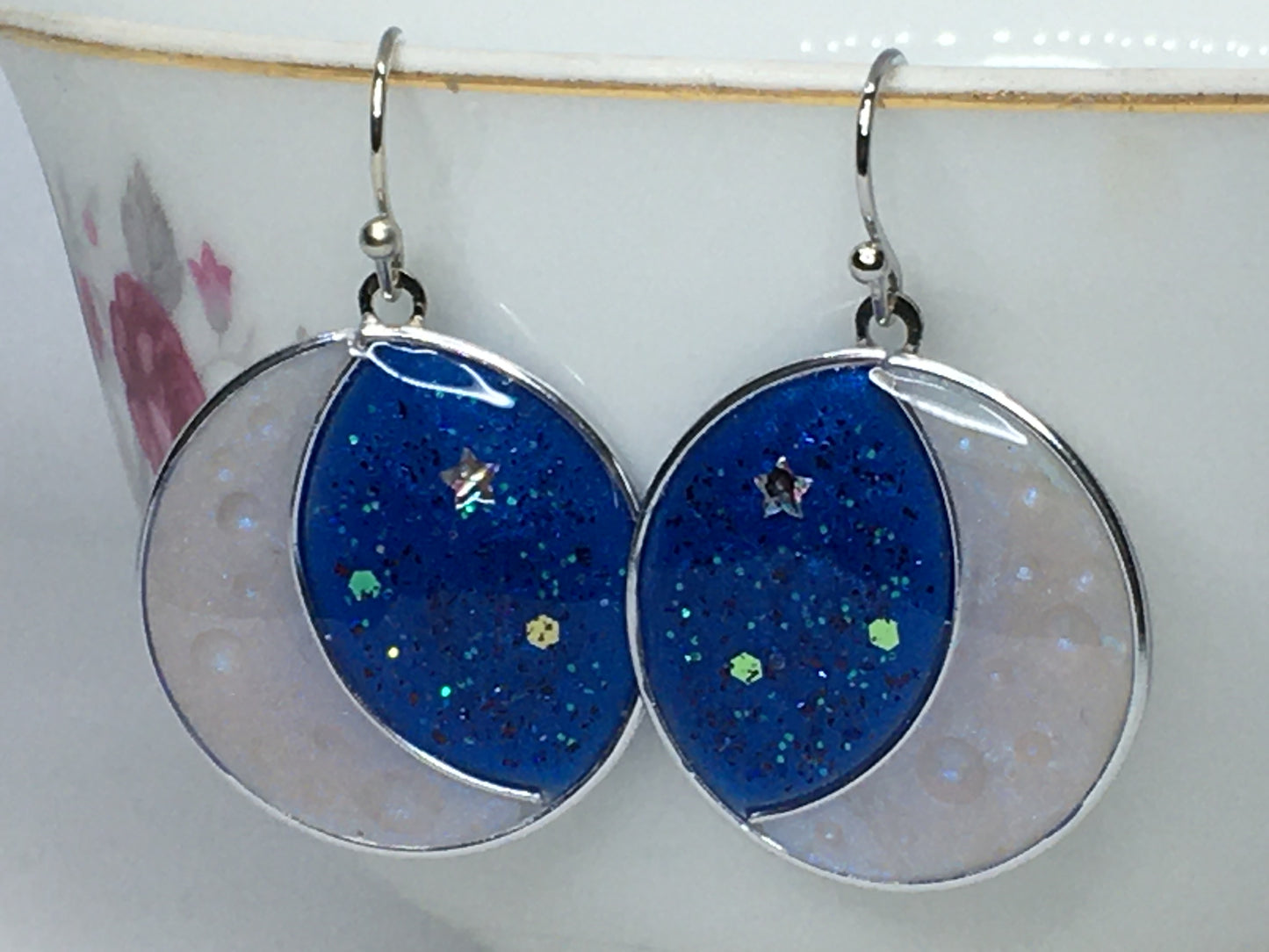 Crescent moon earrings.