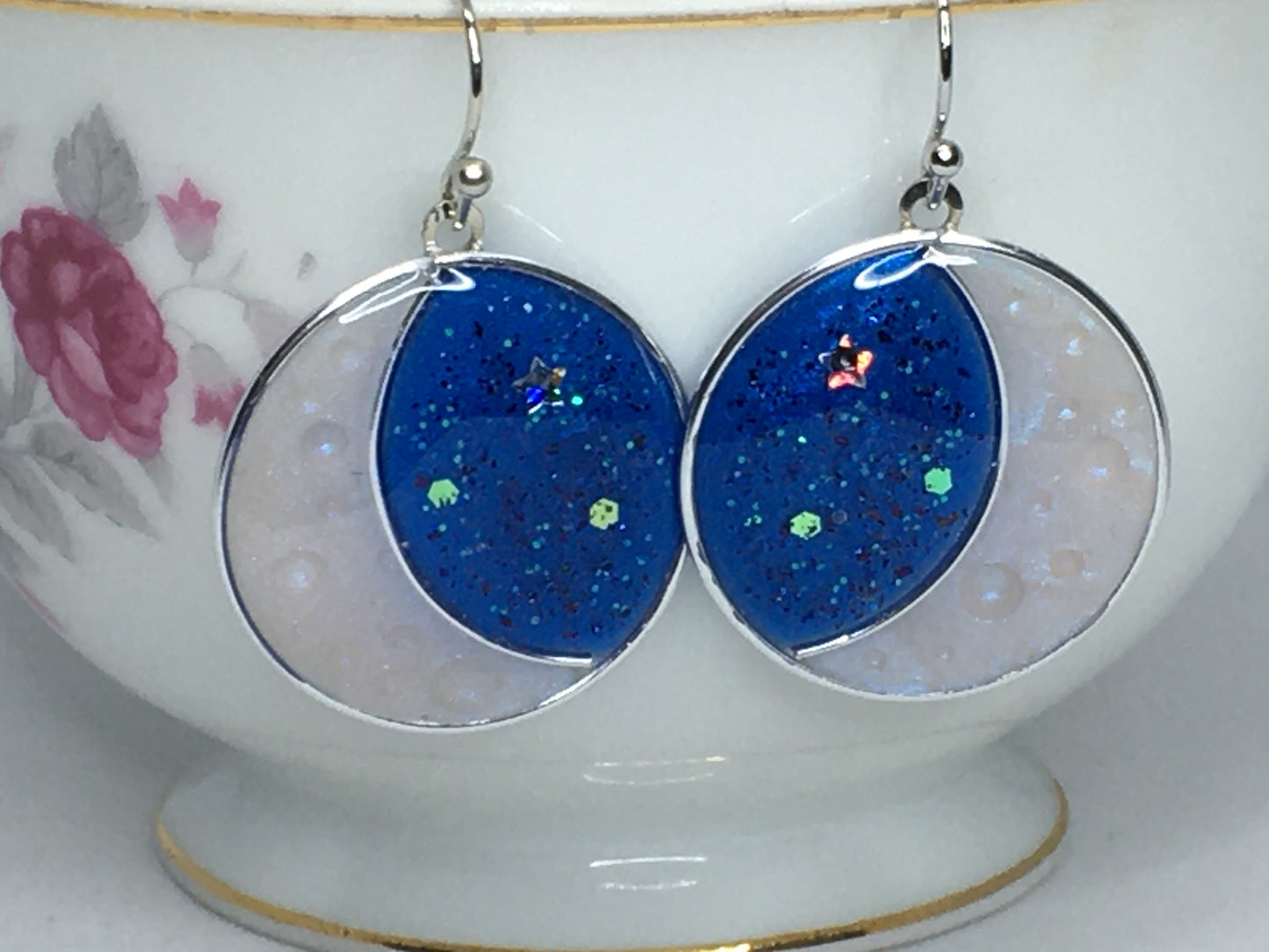 Crescent moon earrings.