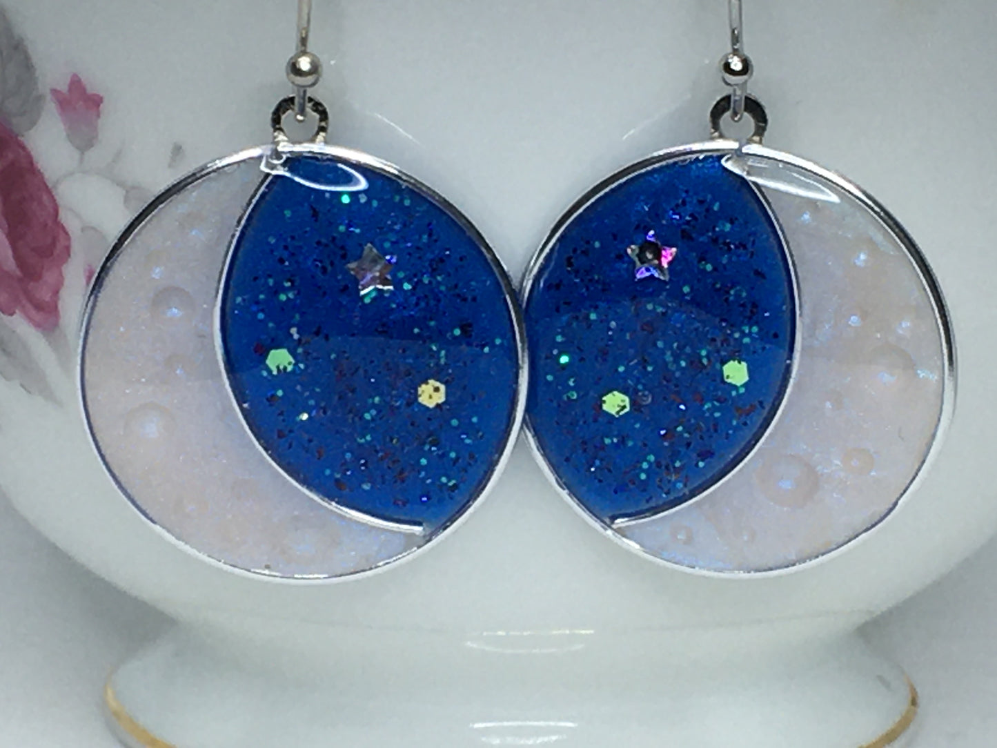 Crescent moon earrings.