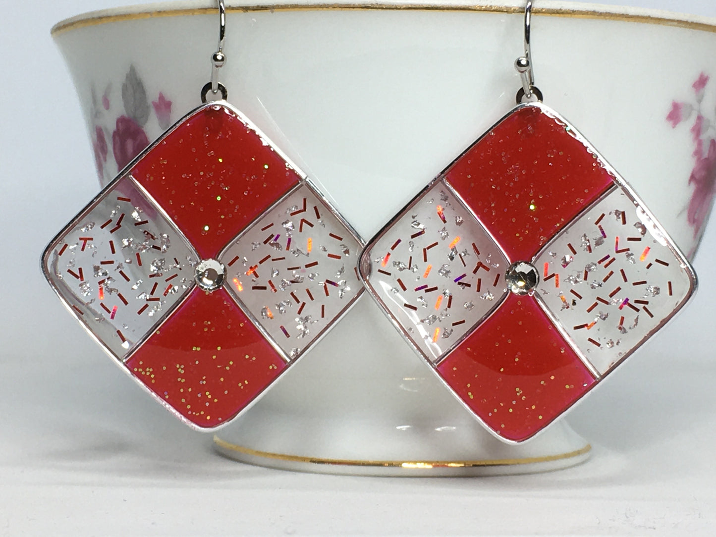 Red and silver resin earrings