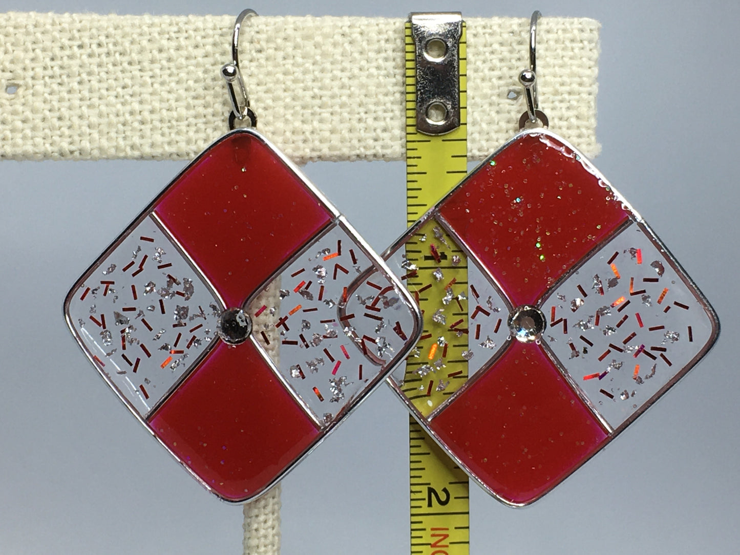 Red and silver resin earrings