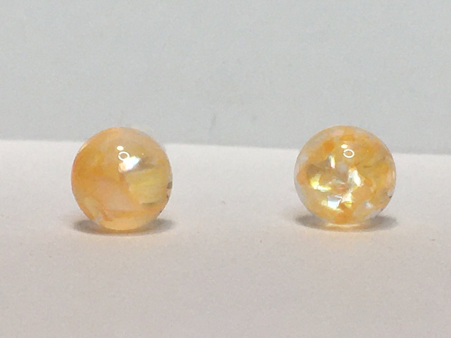 Resin Earrings 1/4", filled with peach dyed crushed seashells
